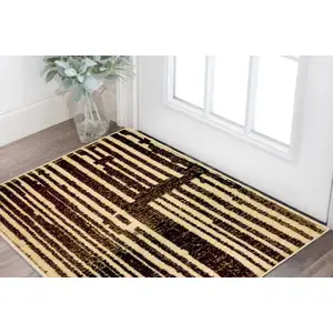 Photo of Tan Black and Red Striped Non Skid Area Rug