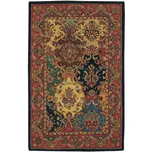 Photo of Tan Black and Red Wool Floral Area Rug