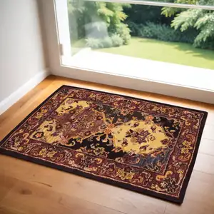 Photo of Tan Black and Red Wool Floral Area Rug