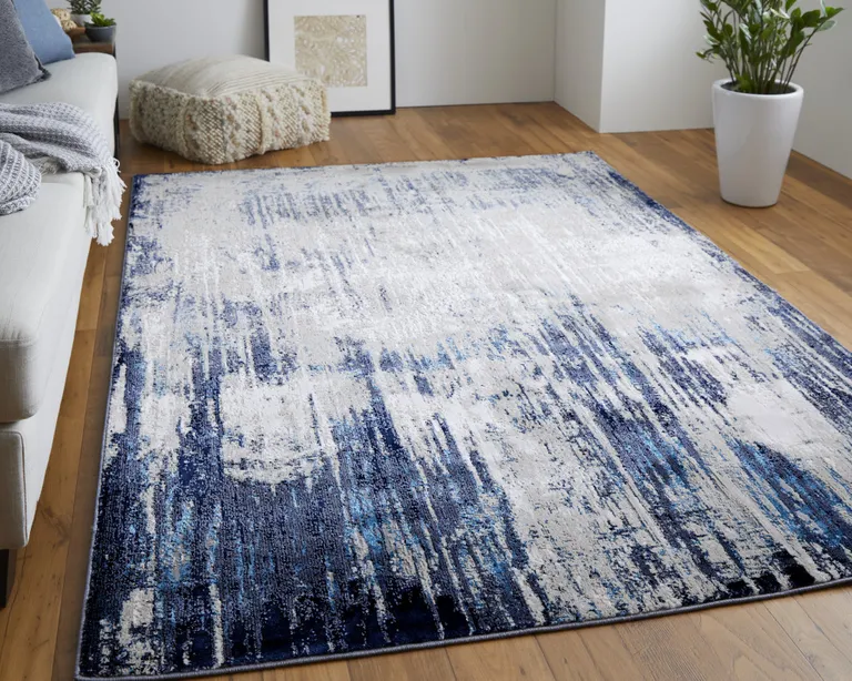 Tan Blue And Ivory Abstract Power Loom Distressed Area Rug Photo 3