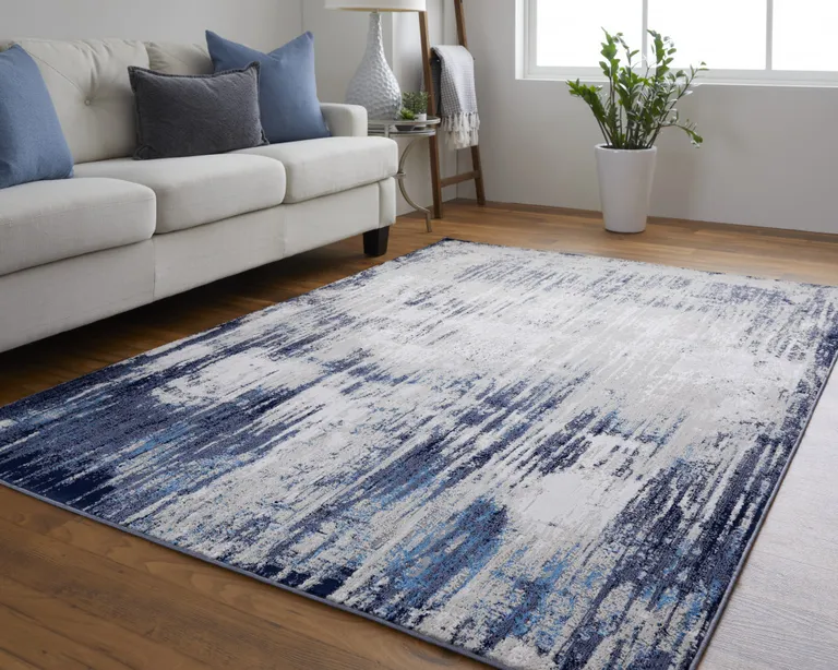 Tan Blue And Ivory Abstract Power Loom Distressed Area Rug Photo 2