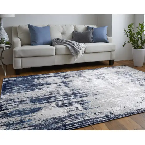 Tan Blue And Ivory Abstract Power Loom Distressed Area Rug Photo 8