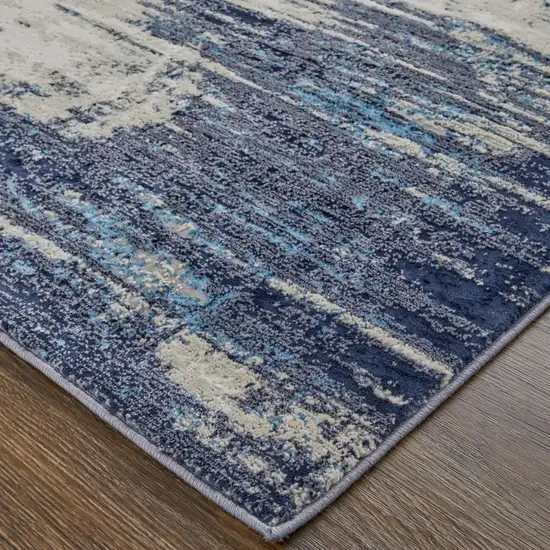 Tan Blue And Ivory Abstract Power Loom Distressed Area Rug Photo 3