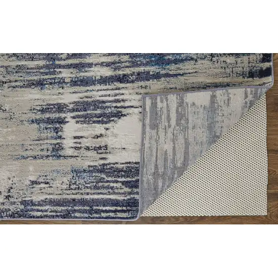 Tan Blue And Ivory Abstract Power Loom Distressed Area Rug Photo 4