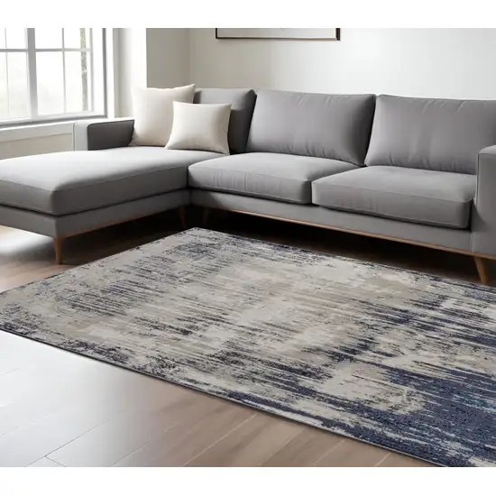 Tan and Blue Abstract Power Loom Distressed Non Skid Area Rug Photo 1