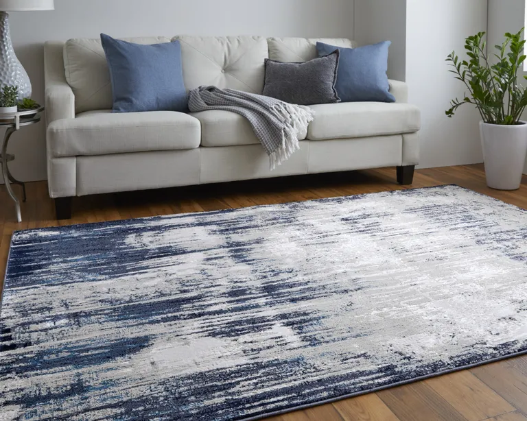 Tan Blue And Ivory Abstract Power Loom Distressed Area Rug Photo 2