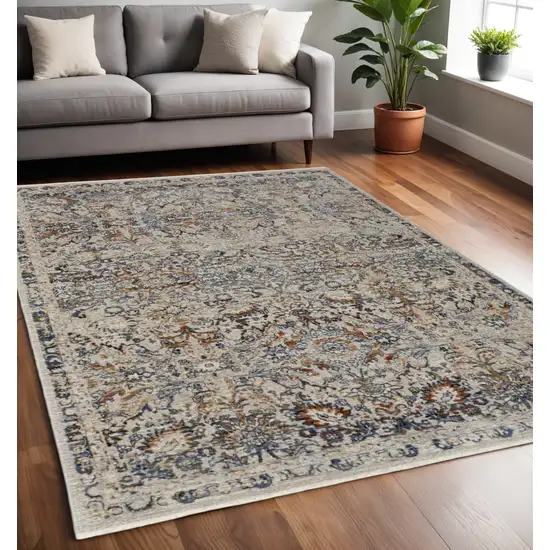 Tan and Blue Floral Power Loom Distressed Non Skid Area Rug With Fringe Photo 2