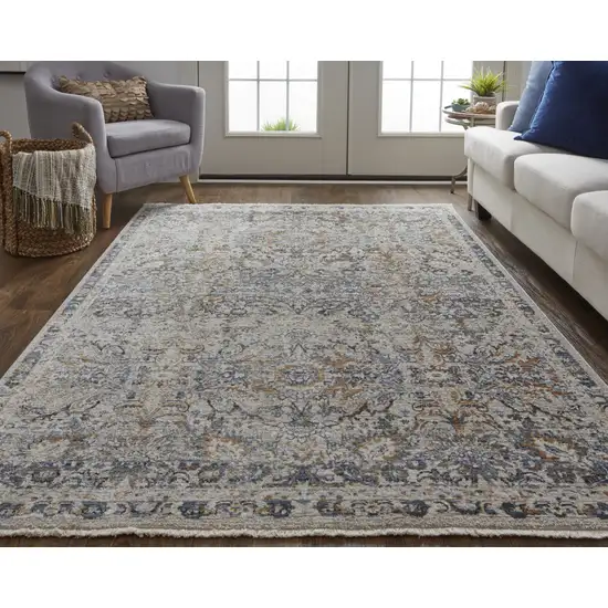 Tan Blue And Orange Floral Power Loom Distressed Area Rug With Fringe Photo 6