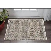 Photo of Tan Blue and Brown Damask Power Loom Area Rug With Fringe