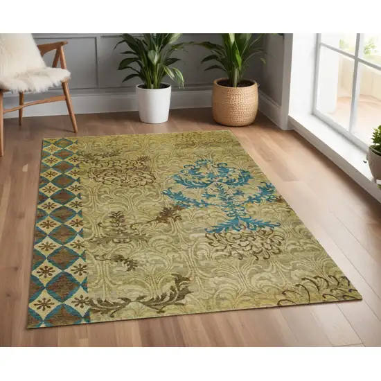 Tan Blue and Brown Floral Hand Knotted Area Rug Photo 1