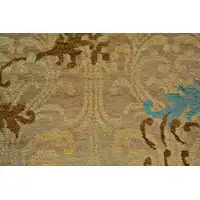 Photo of Tan Blue and Brown Floral Hand Knotted Area Rug