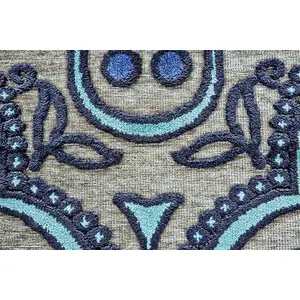 Photo of Tan Blue and Taupe Damask Power Loom Area Rug