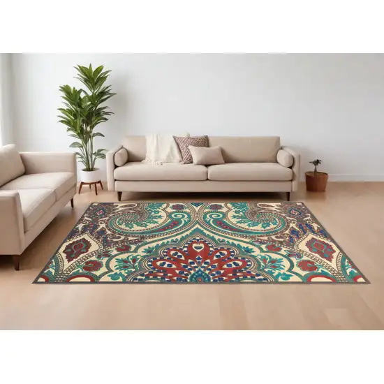 Tan Blue and Taupe Paisley Power Loom Area Rug Photo 1