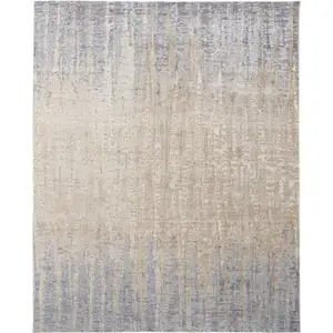 Photo of Tan Brown And Blue Abstract Power Loom Distressed Area Rug