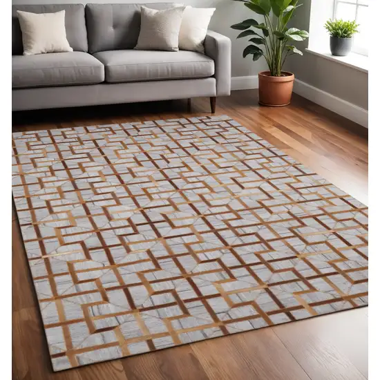 Tan and Brown Geometric Hand Woven Area Rug Photo 1