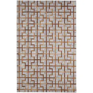 Photo of Tan Brown And Gray Geometric Hand Woven Area Rug