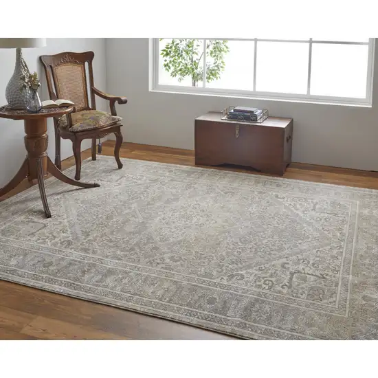 Tan Brown And Ivory Floral Power Loom Distressed Area Rug Photo 8