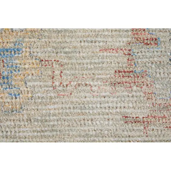 Tan Brown and Blue Floral Hand Woven Distressed Area Rug With Fringe Photo 8