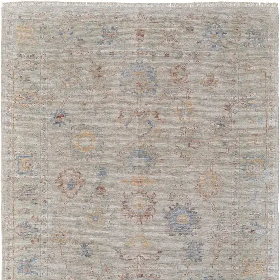 Tan Brown and Blue Floral Hand Woven Distressed Area Rug With Fringe Photo 5