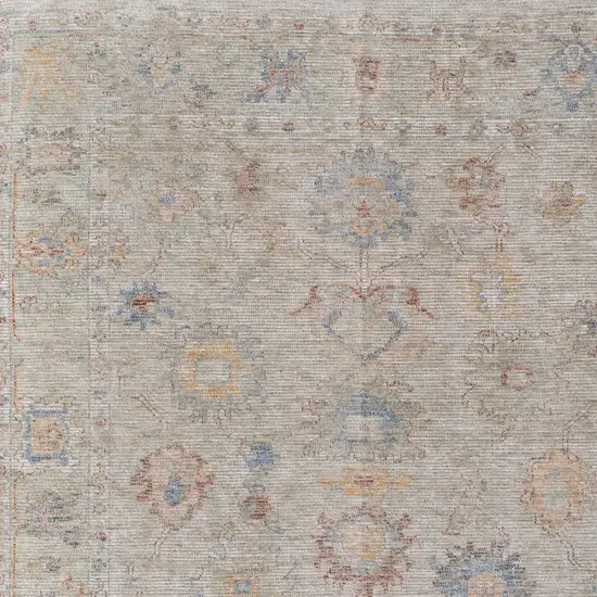 Tan Brown and Blue Floral Hand Woven Distressed Area Rug With Fringe Photo 9