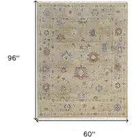 Photo of Tan Brown and Blue Wool Floral Hand Knotted Area Rug With Fringe