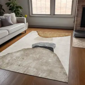 Photo of Tan Brown and Gray Abstract Washable Non Skid Indoor Outdoor Area Rug