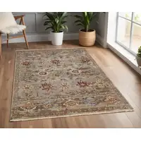 Photo of Tan Brown and Gray Wool Floral Hand Knotted Area Rug With Fringe