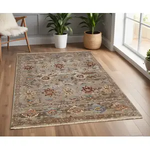 Photo of Tan Brown and Gray Wool Floral Hand Knotted Area Rug With Fringe