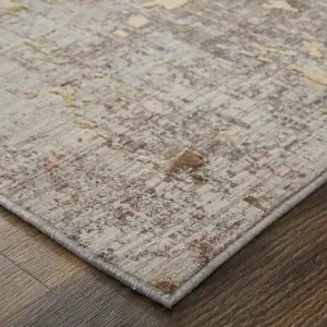 Photo of Tan Brown and Taupe Abstract Power Loom Area Rug