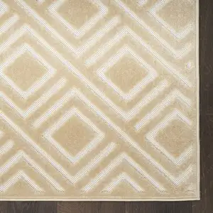 Photo of Tan Geometric Area Rug