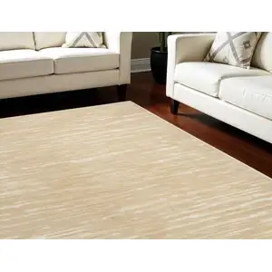 Photo of Tan Geometric Area Rug