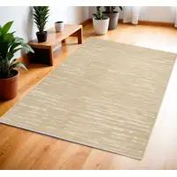 Photo of Tan Geometric Area Rug