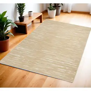 Photo of Tan Geometric Area Rug