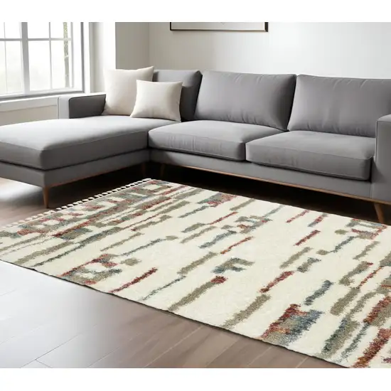 Tan Gray And Ivory Abstract Shag Distressed Area Rug With Fringe Photo 1