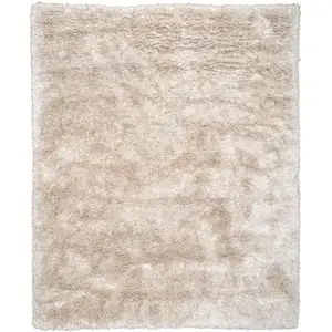 Photo of Tan Hand Woven Area Rug