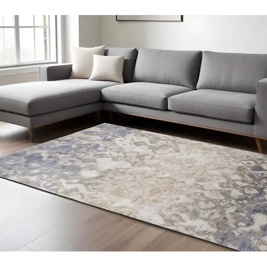 Tan and Ivory Abstract Power Loom Distressed Non Skid Area Rug Photo 1