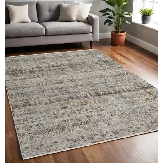 Tan and Ivory Geometric Power Loom Distressed Non Skid Area Rug With Fringe Photo 1