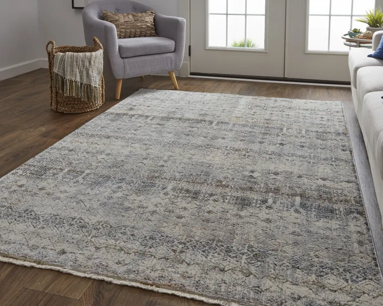 Tan Ivory And Blue Geometric Power Loom Distressed Area Rug With Fringe Photo 1