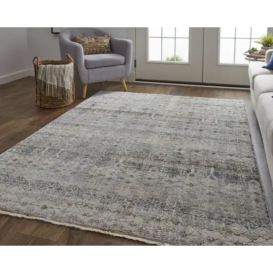 Tan Ivory And Blue Geometric Power Loom Distressed Area Rug With Fringe Photo 1