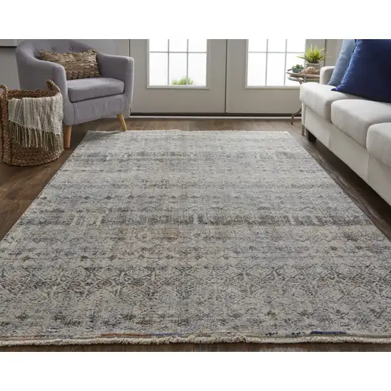 Tan Ivory And Blue Geometric Power Loom Distressed Area Rug With Fringe Photo 9