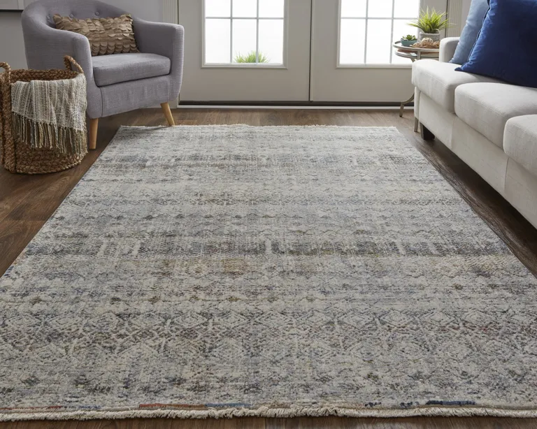 Tan Ivory And Blue Geometric Power Loom Distressed Area Rug With Fringe Photo 4