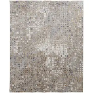 Photo of Tan Ivory And Blue Geometric Power Loom Distressed Area Rug