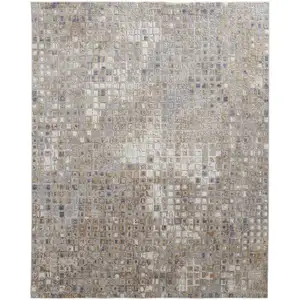 Photo of Tan Ivory And Blue Geometric Power Loom Distressed Area Rug