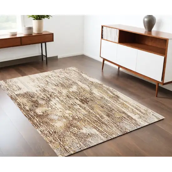 Tan Ivory And Brown Abstract Area Rug Photo 1