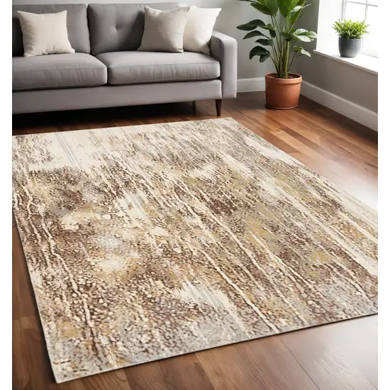 Tan and Ivory Abstract Non Skid Area Rug Photo 1