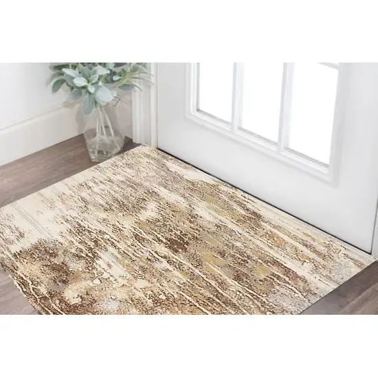 Tan Ivory And Brown Abstract Area Rug Photo 1