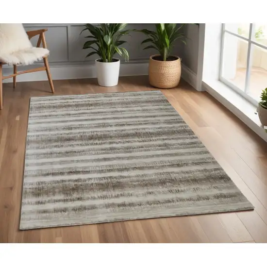 Tan and Ivory Abstract Hand Woven Area Rug Photo 1