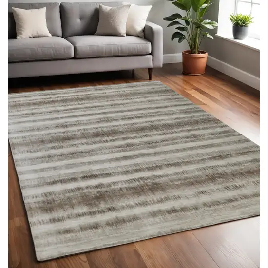 Tan and Ivory Abstract Hand Woven Area Rug Photo 1