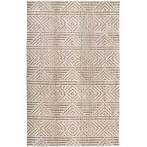 Photo of Tan Ivory And Brown Geometric Stain Resistant Area Rug