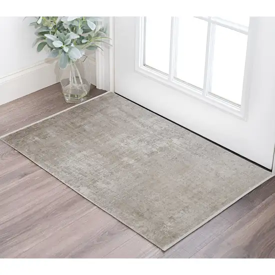 Tan and Ivory Abstract Power Loom Distressed Area Rug With Fringe Photo 1